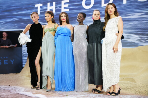 Charlize Theron, from left, Zendaya, Anne Hathaway, Lupita Nyong'o, Samantha Morton, and Mia Goth pose for photographers upon arrival at the premiere of the film 'The Odyssey' on Monday, July 6, 2026, in London. (Photo by Scott A Garfitt/Invision/AP)